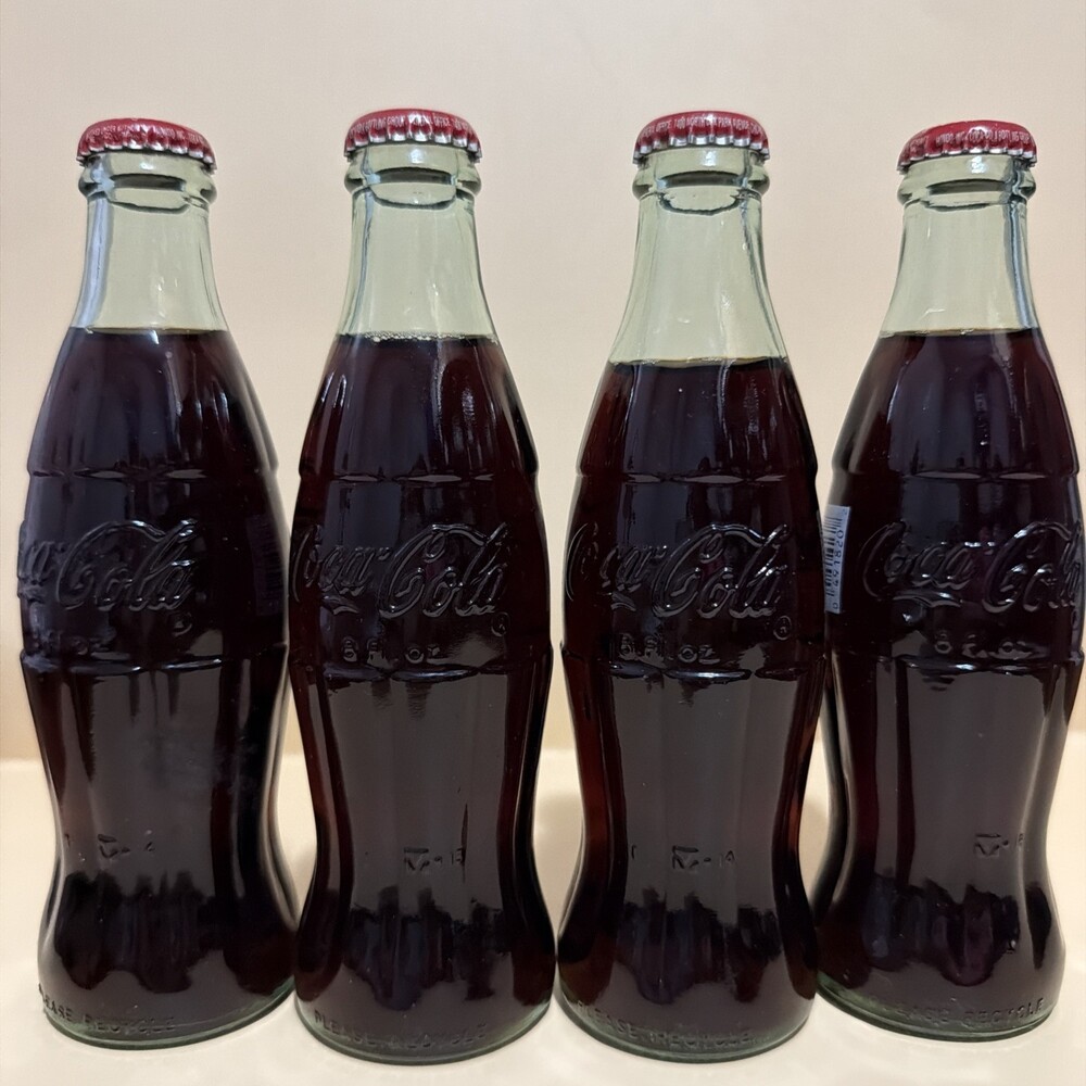 Set Coleccionable de 4 Botellas de Coca-Cola Classic de Vidrio (Edición 1994)